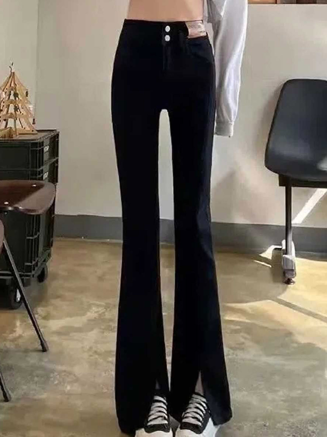 

StyleCast Women Solid Black High-Rise Bootcut Slits Detail Jeans