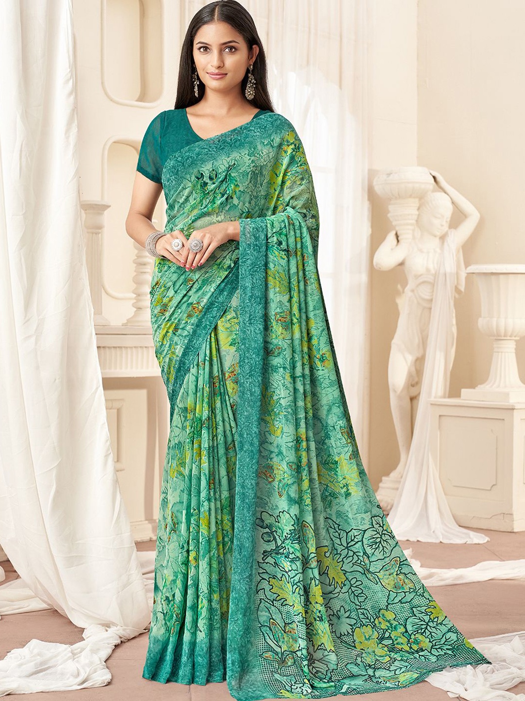 

DIVASTRI Ethnic Motifs Poly Georgette Saree, Teal