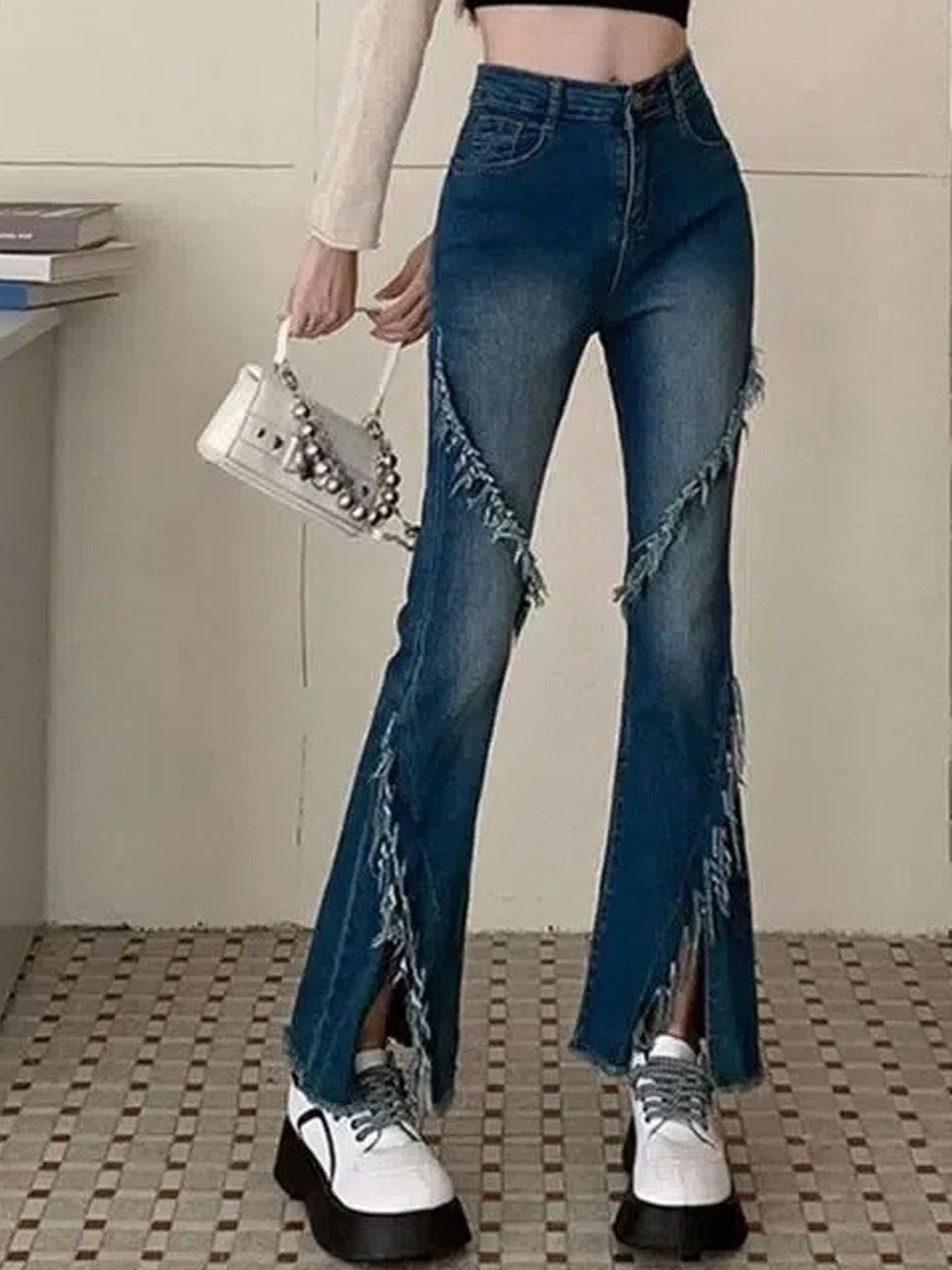 

StyleCast Women Regular Fit Mid-Rise Highly Distressed Light Fade Jeans, Blue
