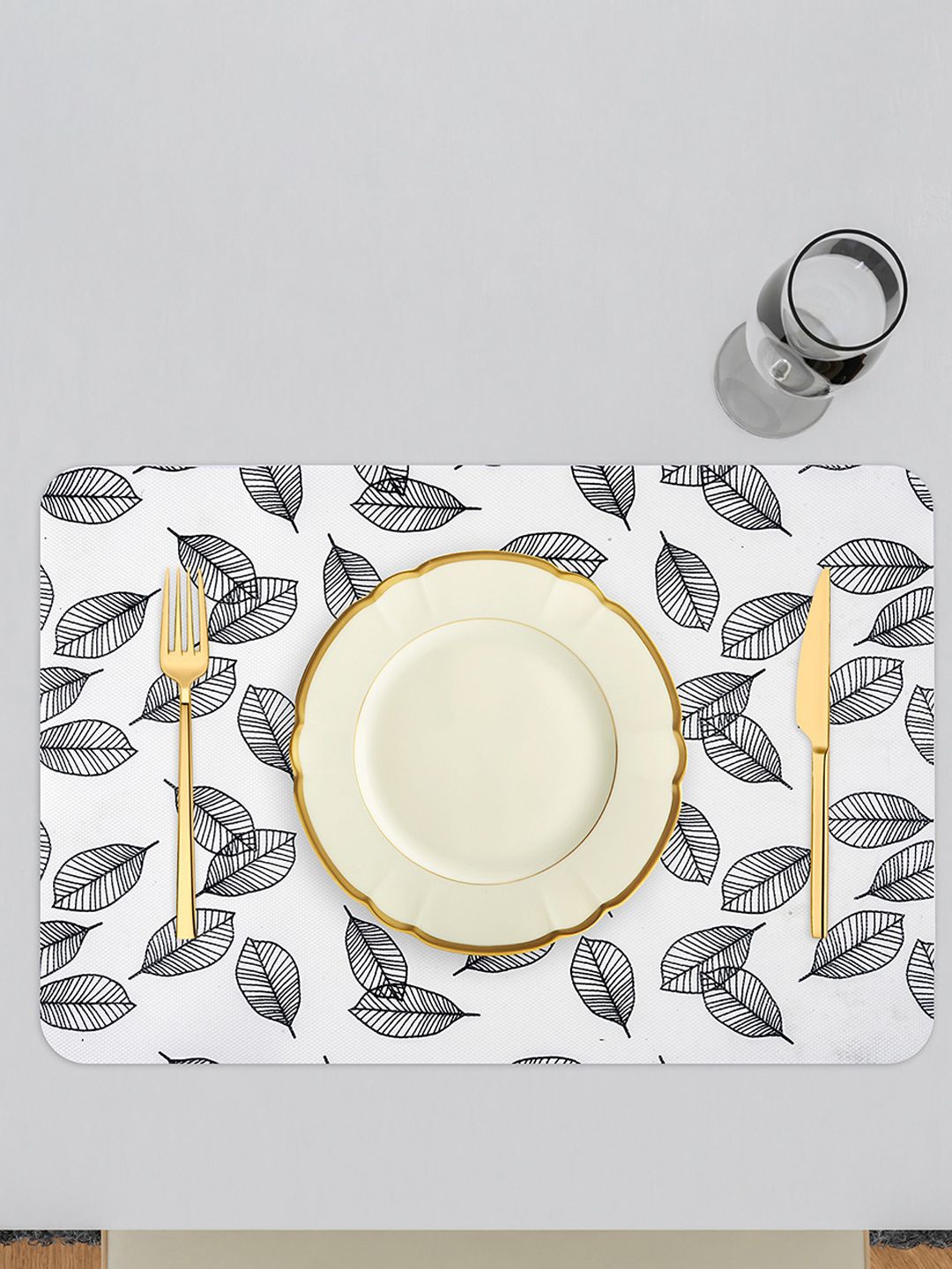 

Kuber Industries White & Black Leaves Printed Table Placemats