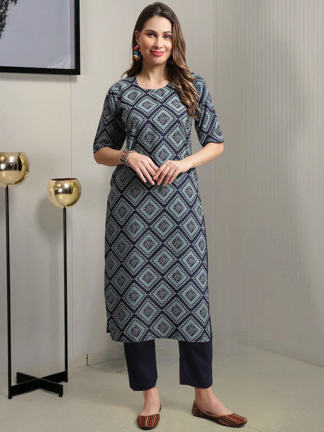 

Moda Rapido Ethnic Motifs Printed Regular Kurta with Trousers, Blue