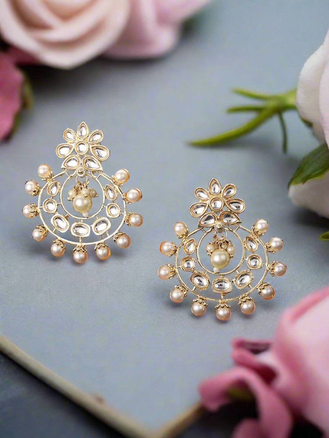 

Anouk Gold Plated Kundan Studded Contemporary Shaped Chandbalis