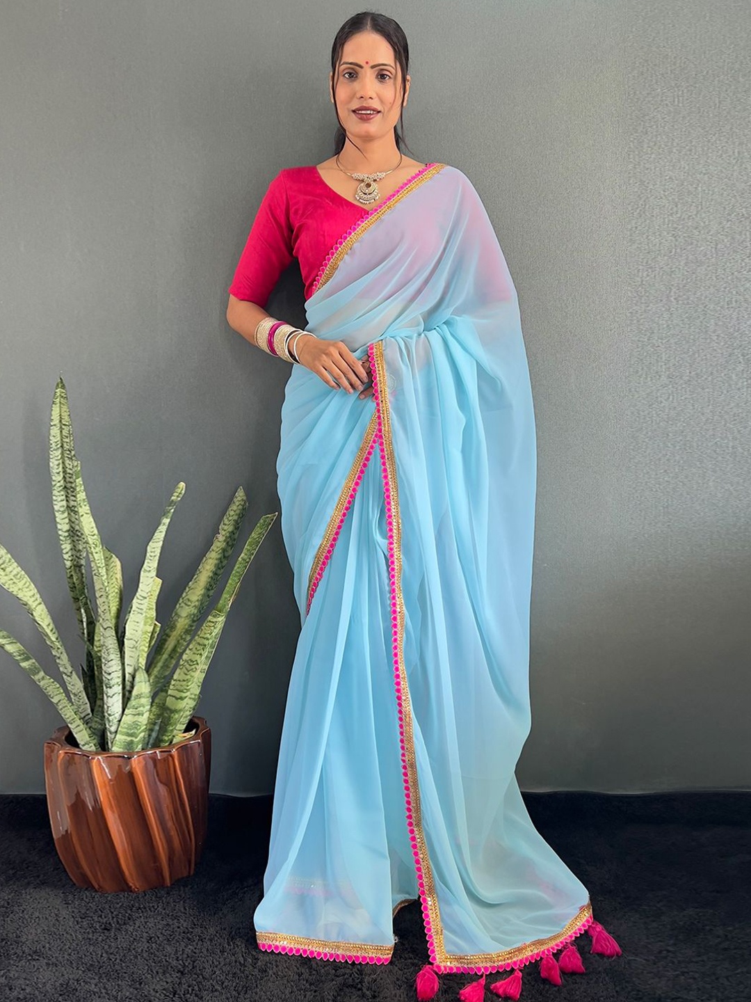

DIVASTRI Embellished Zari Poly Georgette Saree, Blue