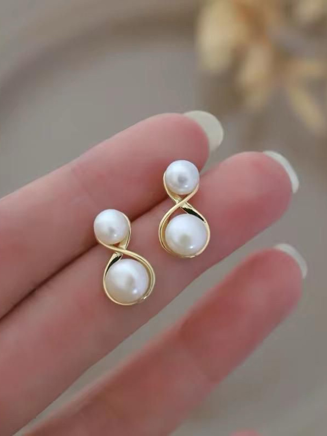 

MADDY SPACE Gold-Plated Mother Of Pearls Studded Contemporary Korean Studs