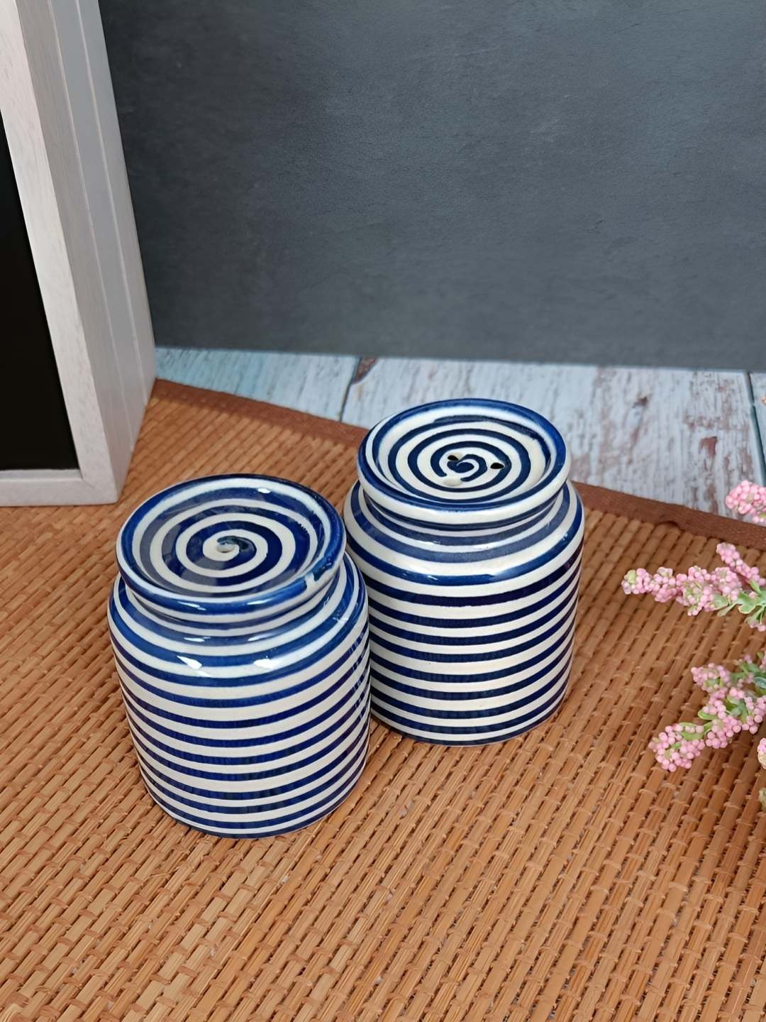 

Myntra Elegant Homes Blue & White Striped Ceramic Salt and Pepper Shakers