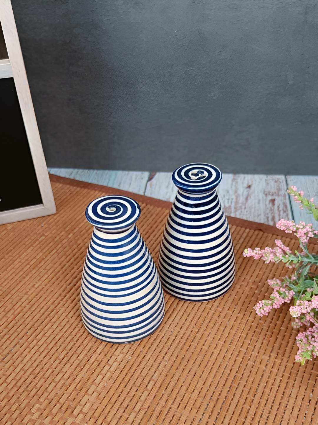 

Myntra Elegant Homes Blue & White Striped Ceramic Salt and Pepper Shakers