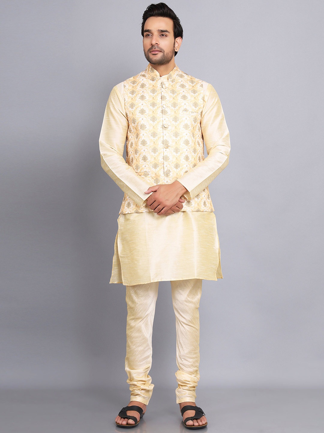 

Sadree Mandarin Collar Dupion Silk Kurta And Churidar With Nehru Jacket Set, Gold