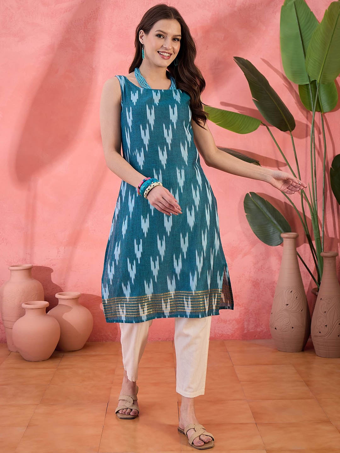 

Sangria Ethnic Motifs Printed Cotton Sleeveless Straight Kurta, Blue