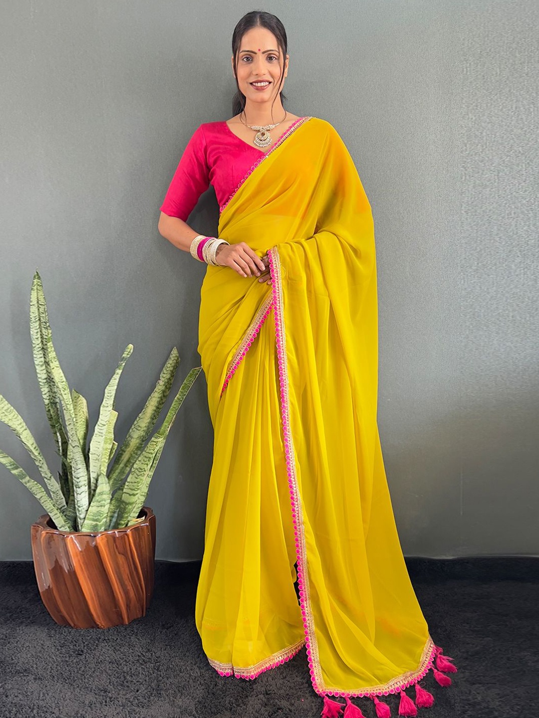 

DIVASTRI Embellished Border Ready To Wear Saree With Blouse Piece, Mustard