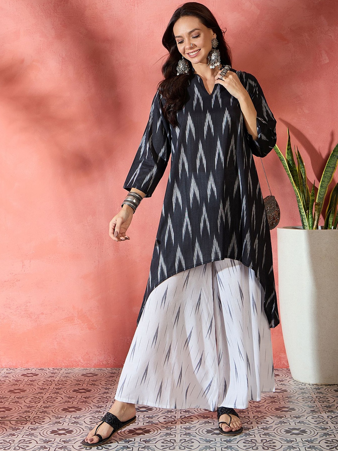 

Sangria Geometric Printed Pure Cotton V-Neck A-line Kurta With Palazzos, Black