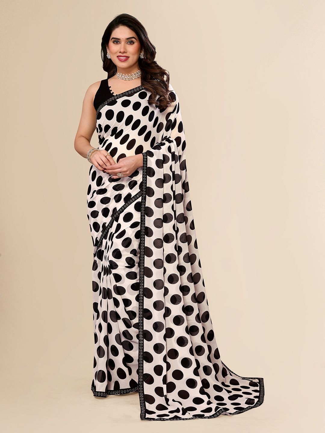 

Moda Rapido Polka Dot Printed Embellished Georgette Saree With An Unstitched Blouse Piece, White