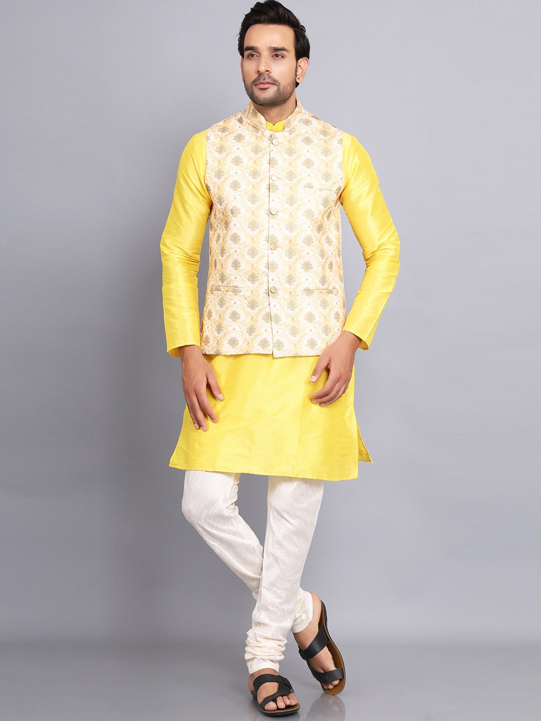 

Sadree Mandarin Collar Dupion Silk Kurta And Churidar With Nehru Jacket Set, Yellow