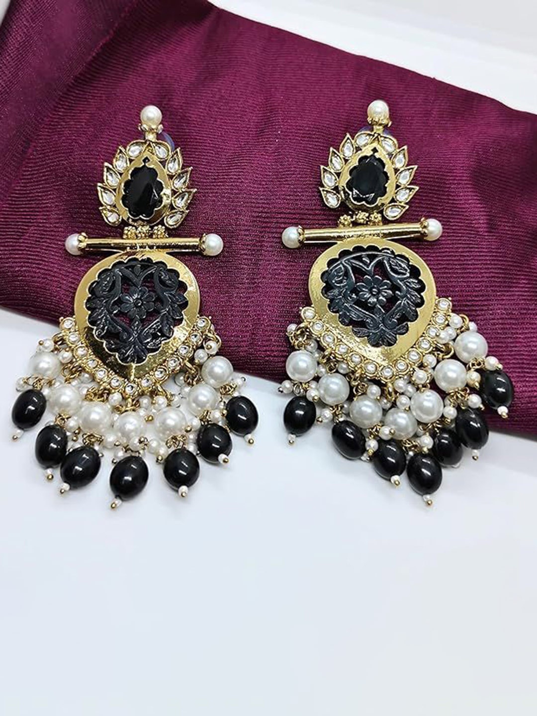 

Lyriss Gold Plated Artificial Stone Studded & Beaded Contemporary Chandbalis