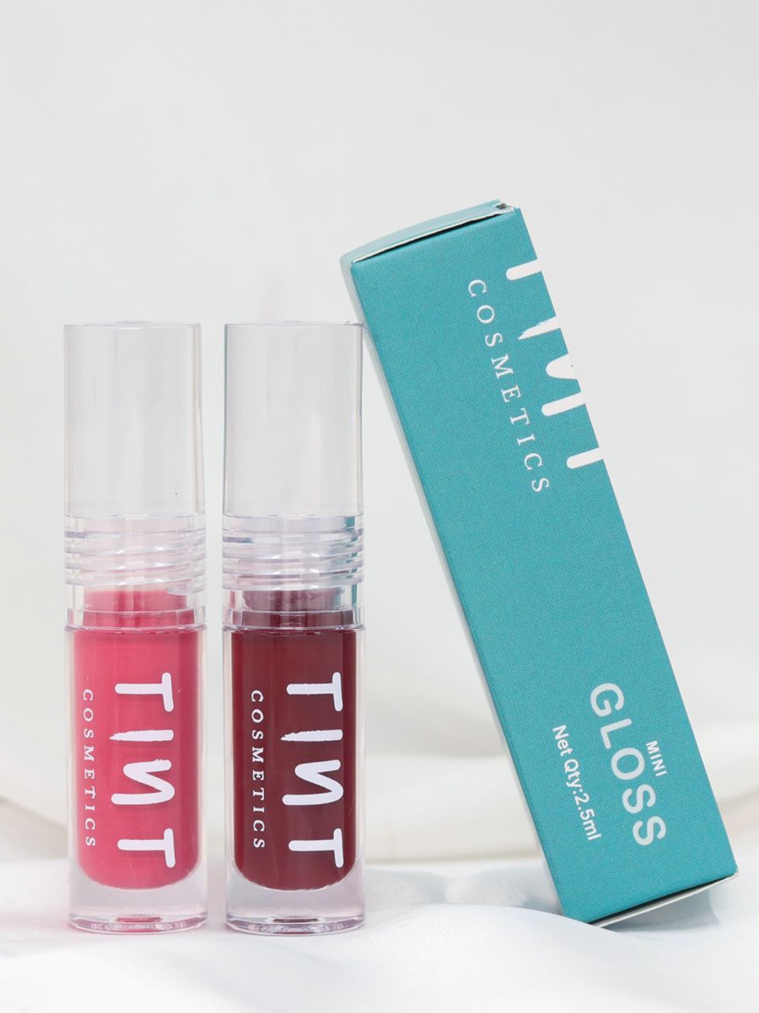 

Tint Cosmetics Set Of 2 Lip Gloss With Vitamin E - 2.5 ml Each - Honey-Pixie, Red