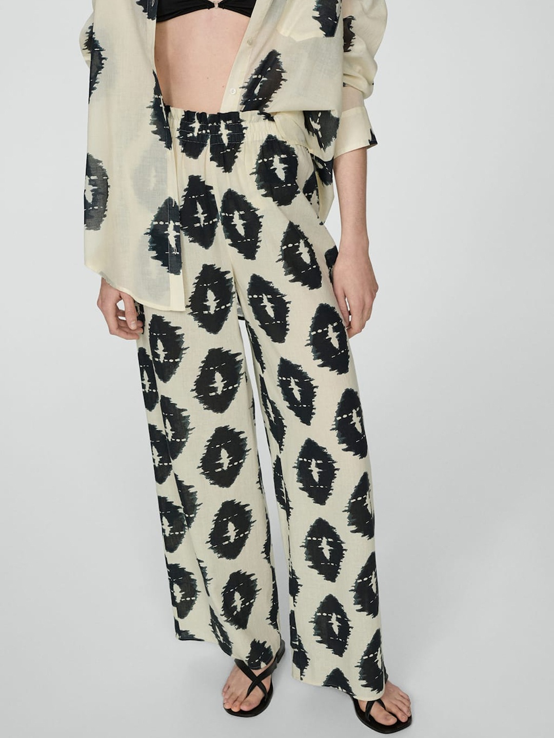 

MANGO Women Printed Flared Pure Cotton Trousers, Beige
