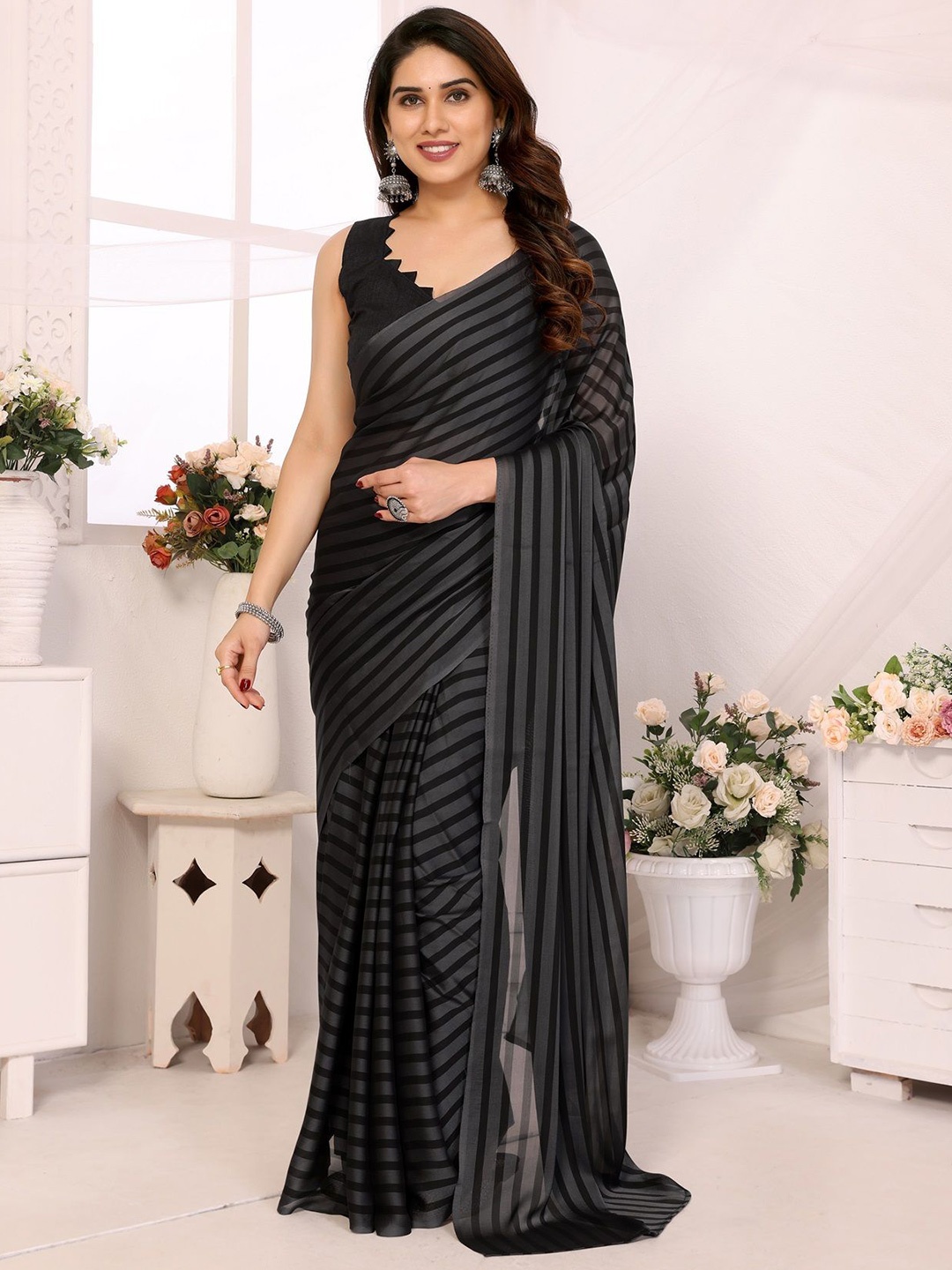 

Fashion FRICKS Ethnic Motifs Poly Georgette Saree, Silver