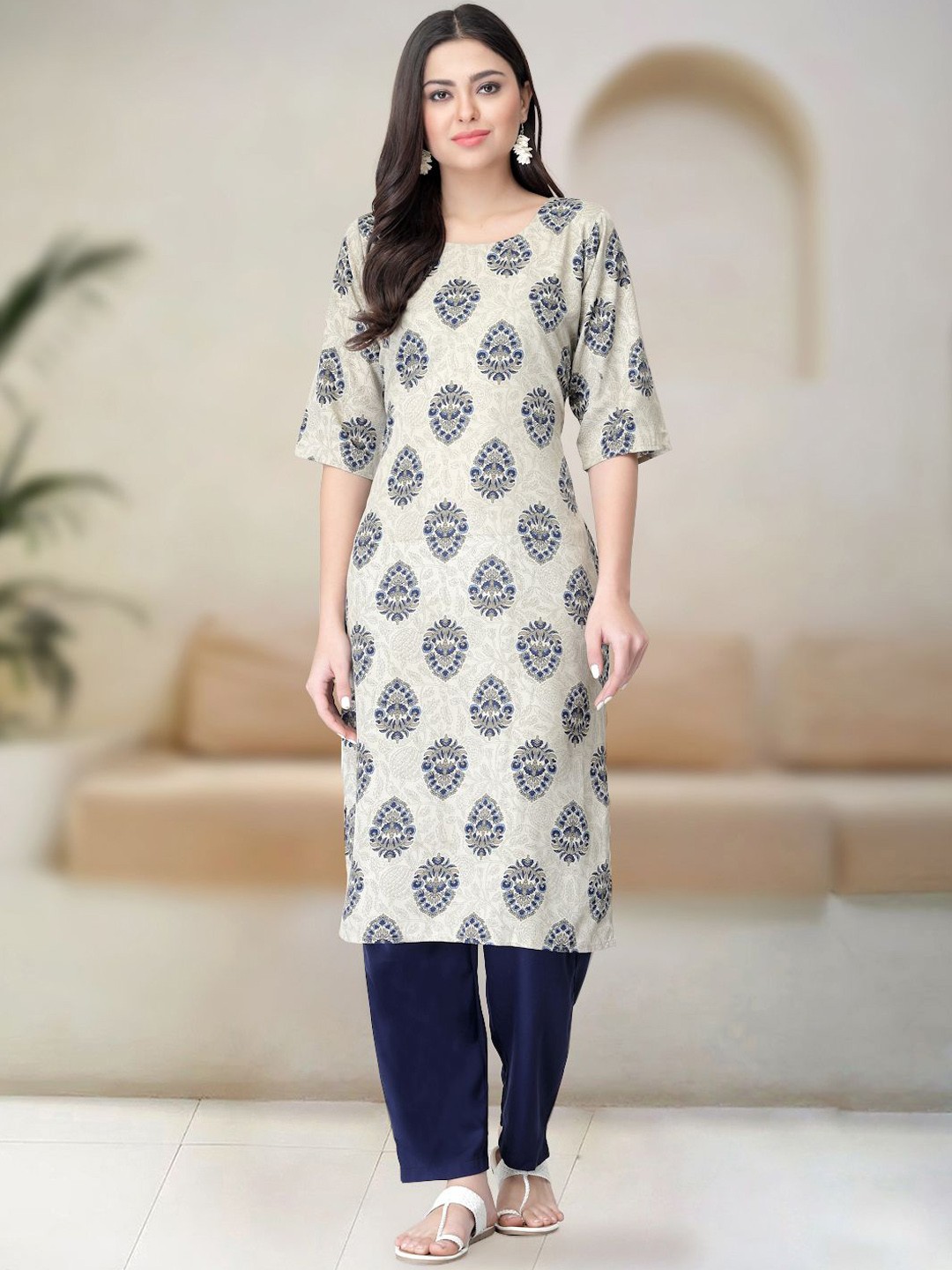 

Moda Rapido Ethnic Motifs Printed Round Neck Straight Kurta With Trousers, Cream