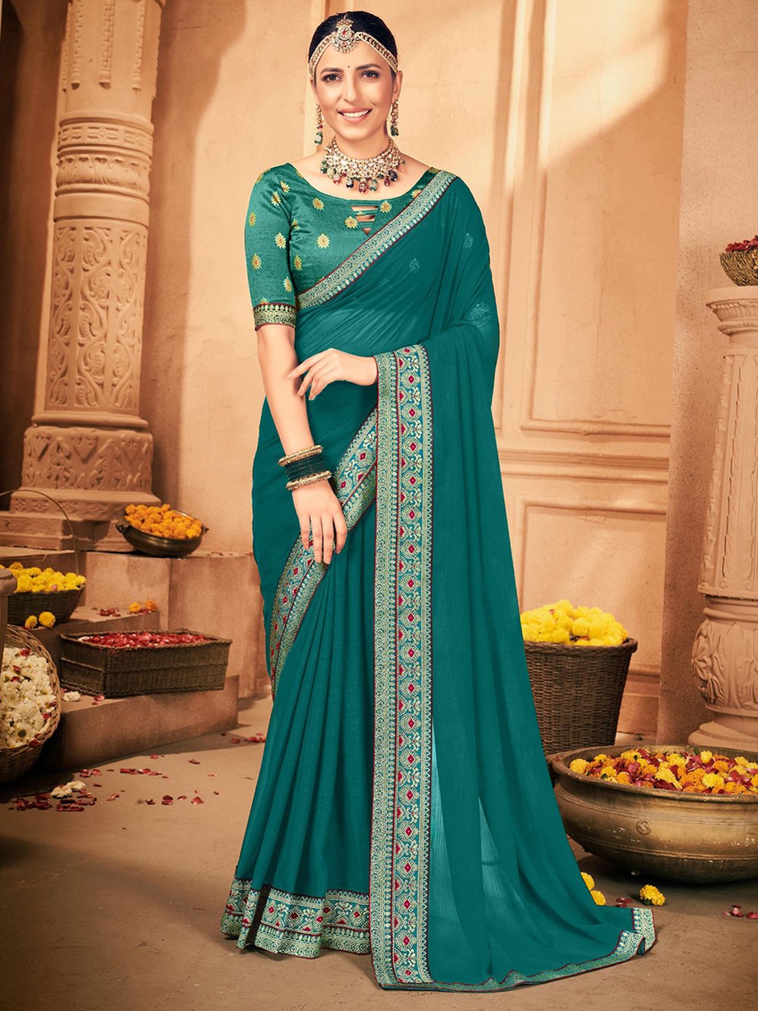 

Mitera Embroidered Pure Georgette Saree, Blue