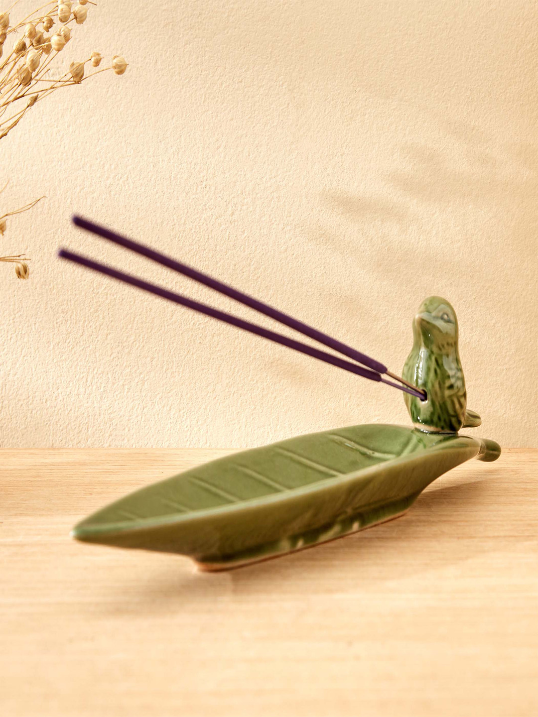 

Home Centre Garnet Serene Green Ceramic Bird Incense Holder