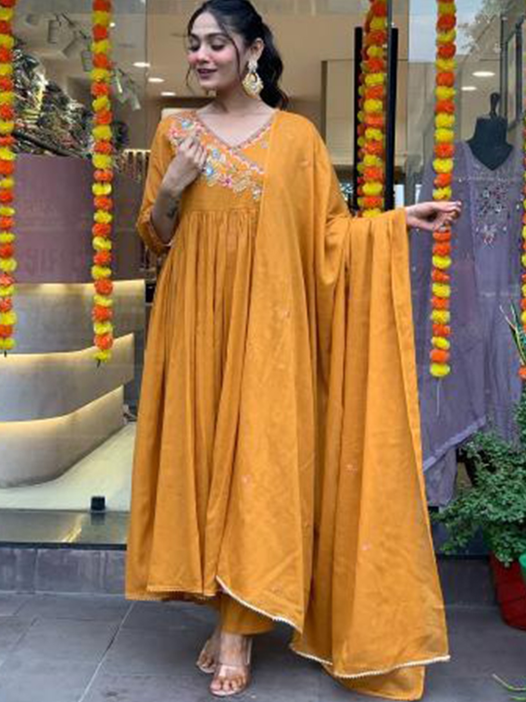 

Moda Rapido Women Floral Embroidered Regular Kurta with Trousers & With Dupatta, Orange