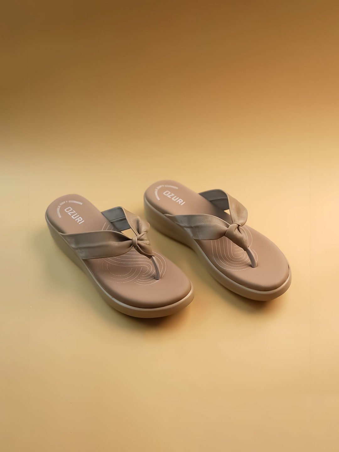 

Ozuri Suede Wedge Sandals with Bows, Beige