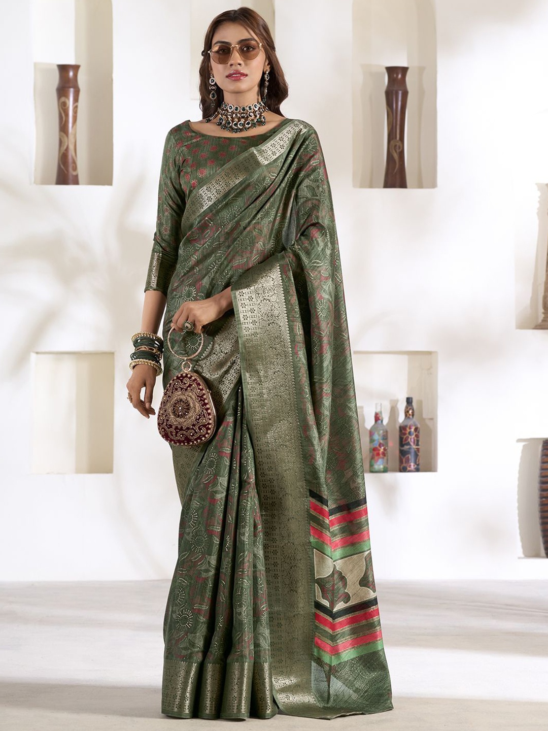 

DIVASTRI Embellished Zari Silk Blend Saree, Green