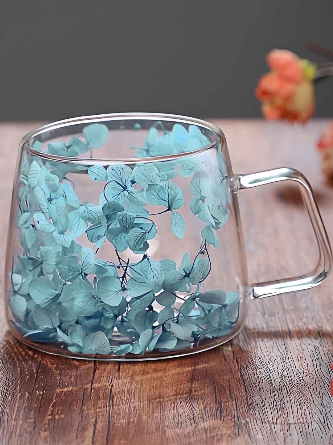 

BonZeaL Teal Borosilicate Glass Transparent Finish Mug With Dried Flower