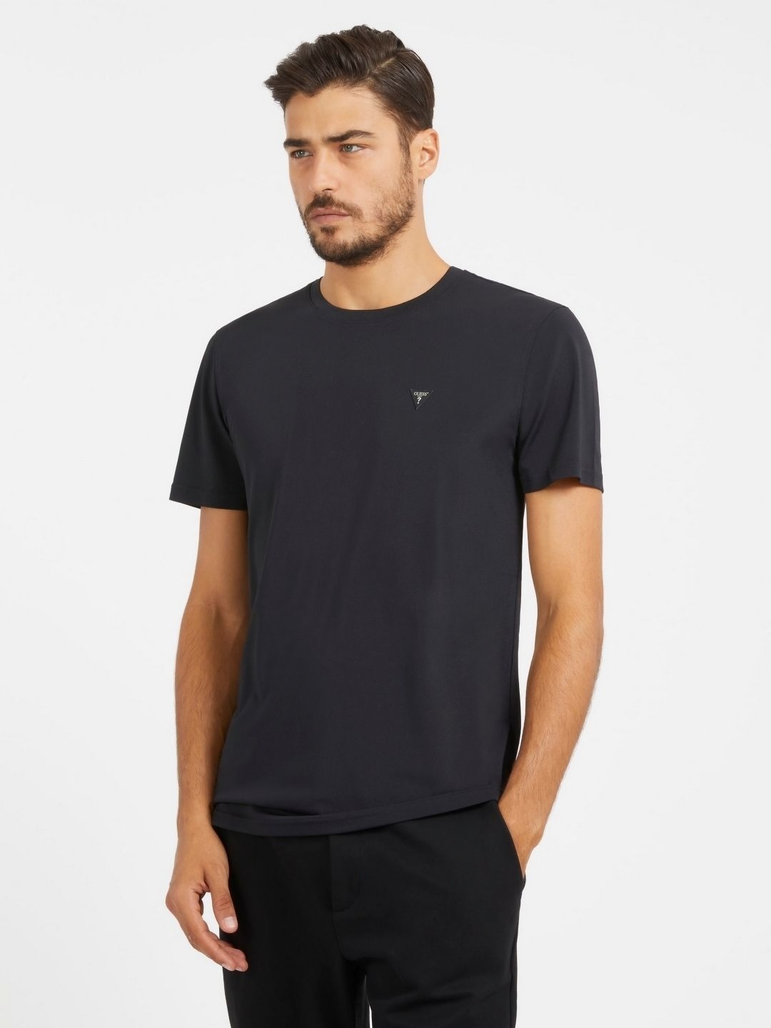 

GUESS Men Solid Round Neck T-shirt, Black