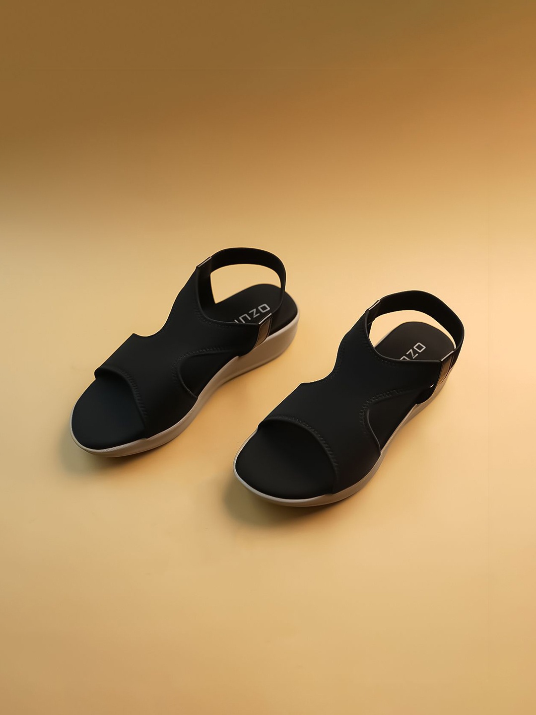 

Ozuri Suede Wedge Sandals with Laser Cuts, Black