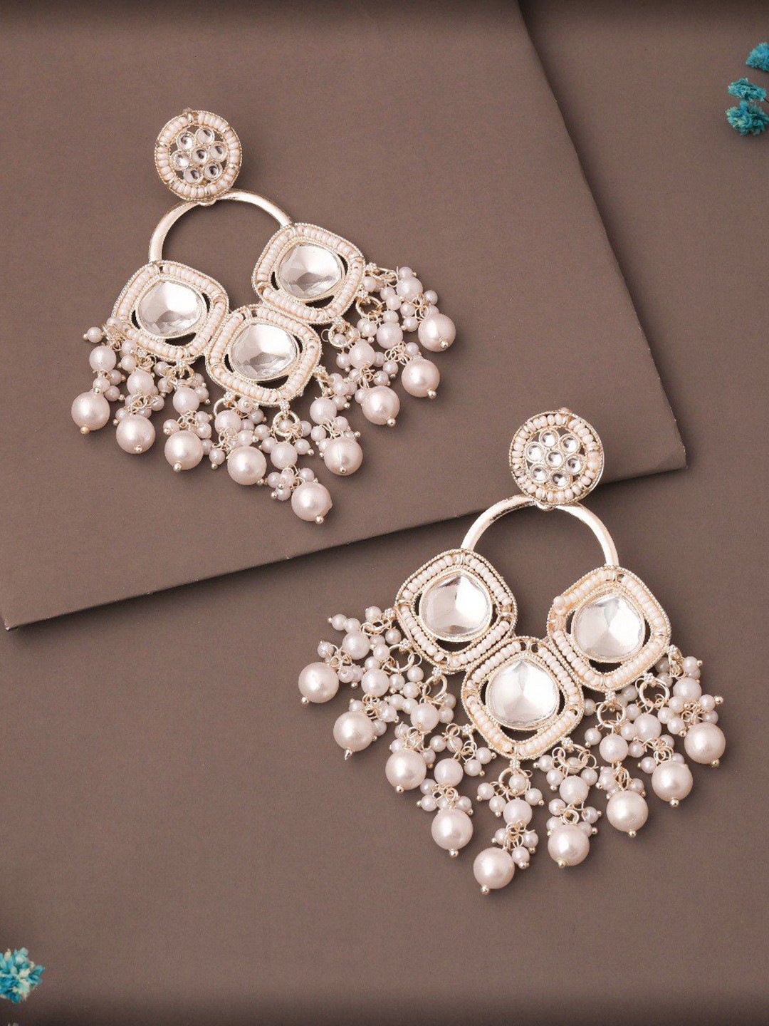 

Lyriss Silver-Plated Artificial Beaded Contemporary Shaped Jhumkas