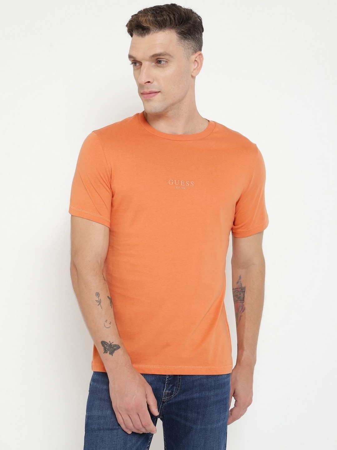 

GUESS Men Solid Round Neck Cotton T-shirt, Orange