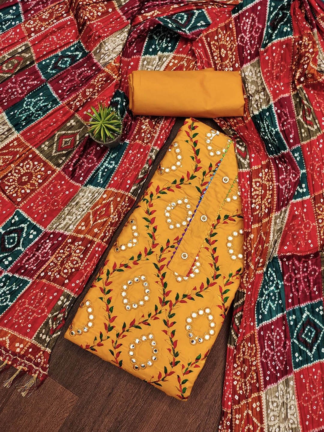 

Rangtulika Floral Embroidered Mirror Work Unstitched Dress Material, Yellow