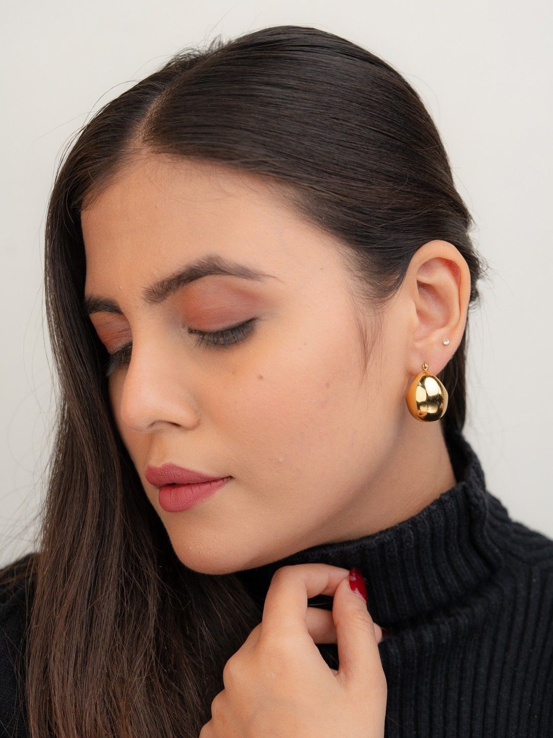 

Zeraki Jewels Stainless Steel Gold-Plated Teardrop Shaped Drop Earrings
