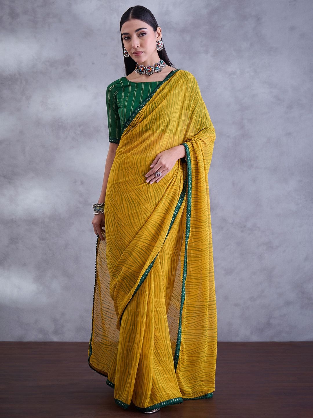 

Mitera Beads and Stones Pure Georgette Saree, Yellow