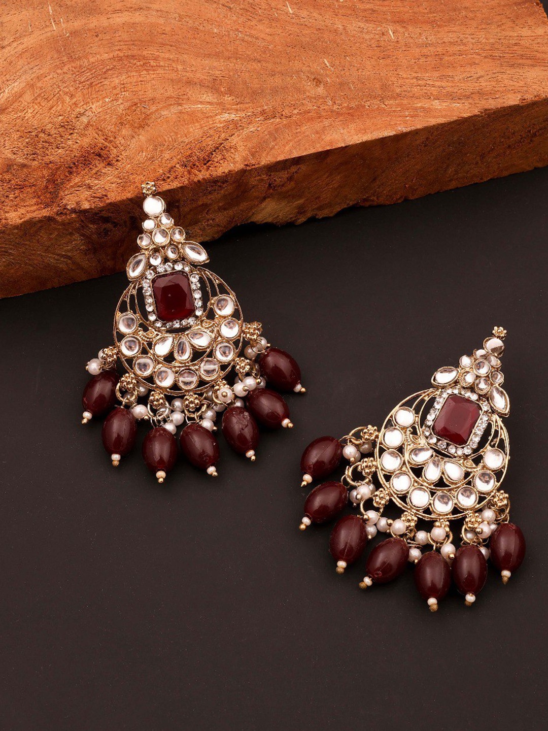 

Lyriss Gold-Plated Artificial Beaded Circular Shaped Jhumkas