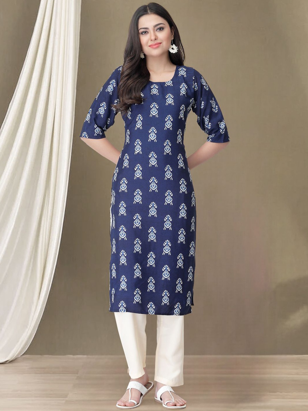 

Moda Rapido Ethnic Motifs Printed Round Neck Ikat Technique Straight Kurta With Trousers, Navy blue