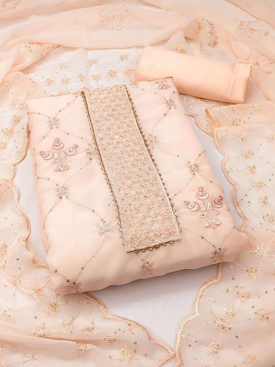 

Rangtulika Ethnics Motifs Embroidered Sequinned Unstitched Dress Material, Cream
