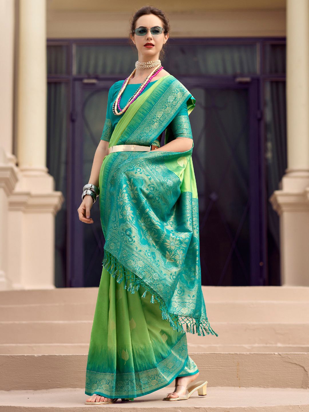 

DIVASTRI Woven Design Zari Silk Blend Saree, Green