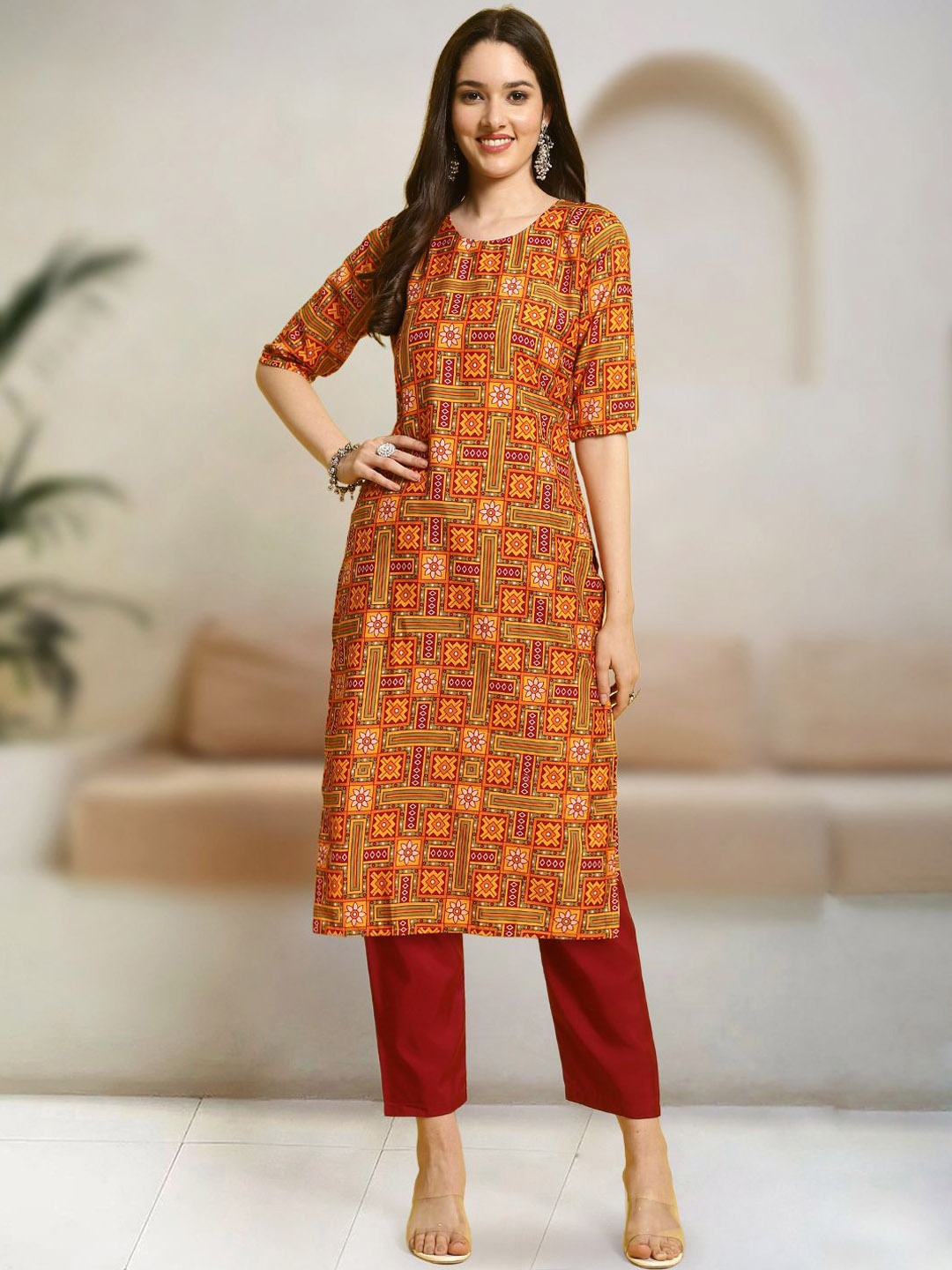 

Moda Rapido Geometric Printed Round Neck Straight Kurta With Trouser, Orange