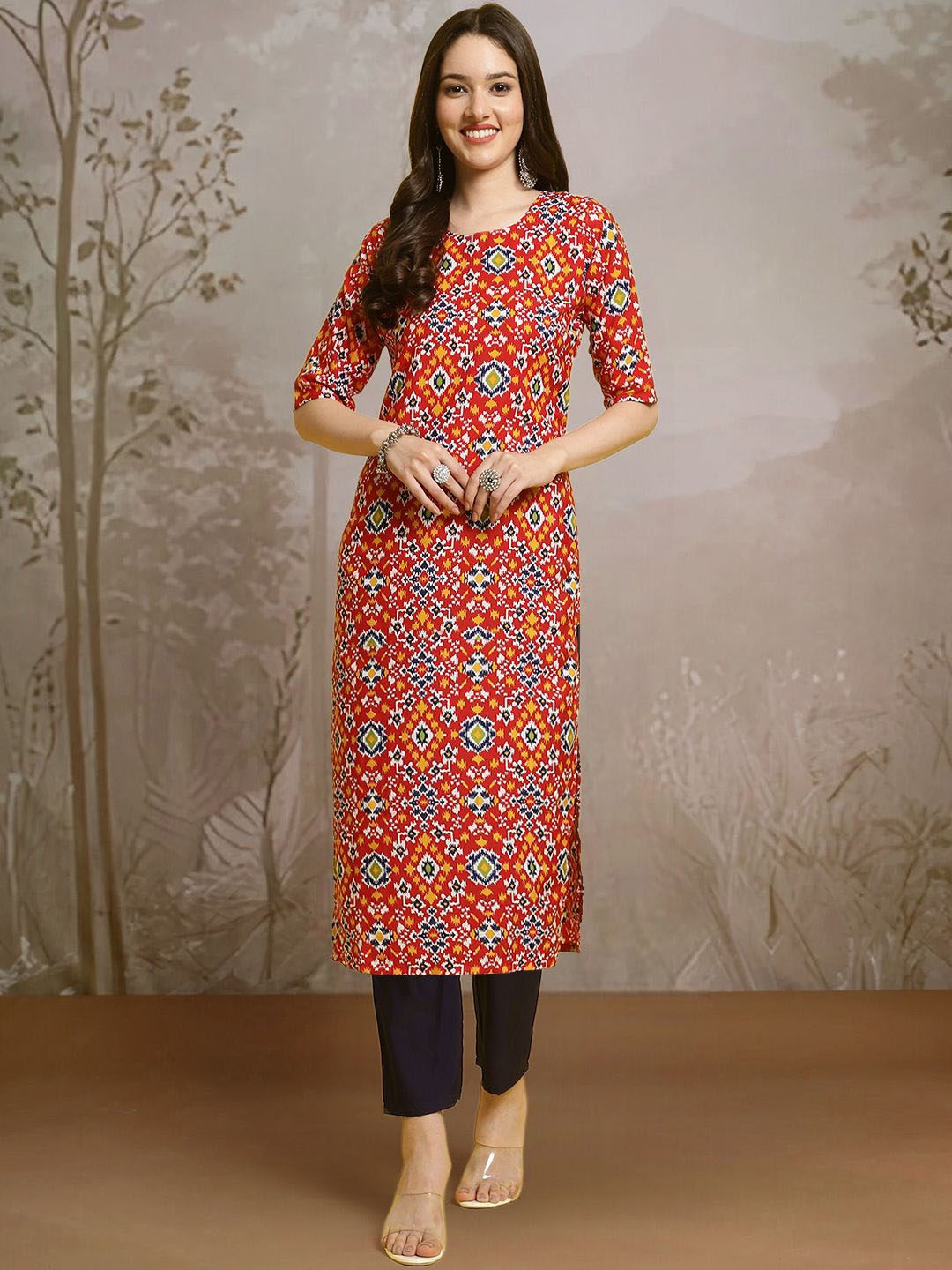 

Moda Rapido Geometric Printed Round Neck Ikat Technique Straight Kurta With Trousers, Red