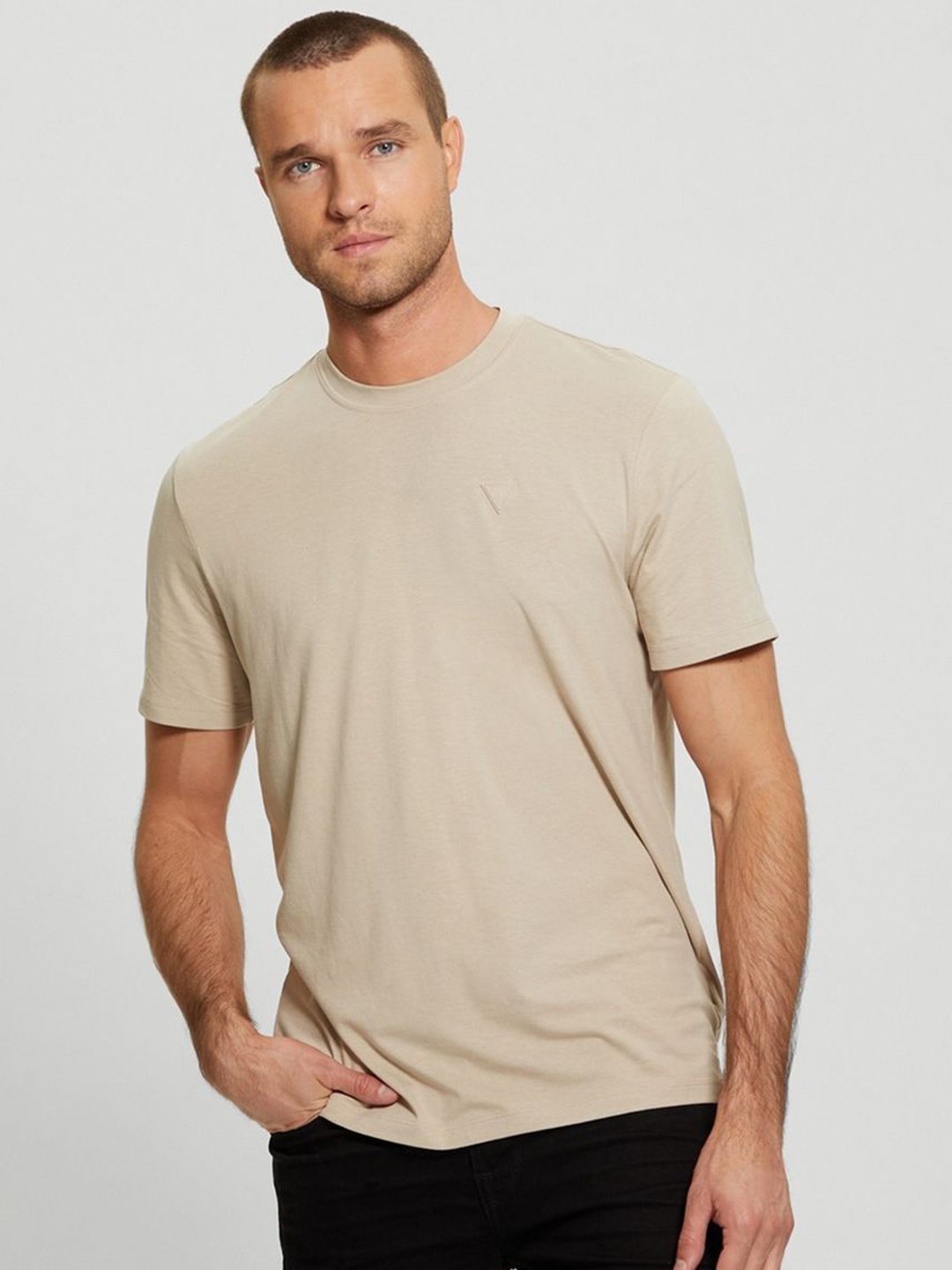 

GUESS Men Solid Round Neck Cotton T-shirt, Beige