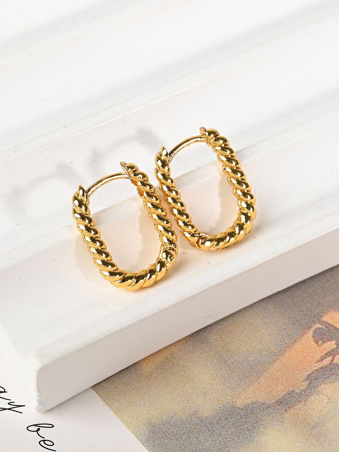 

Krelin Gold-Plated Stainless Steel Twisted U Shaped Hoop Earrings