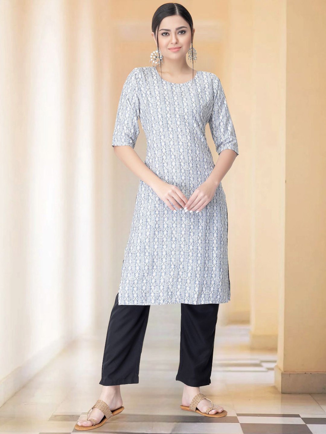 

Moda Rapido Ethnic Motifs Printed Straight Kurta with Trousers, White