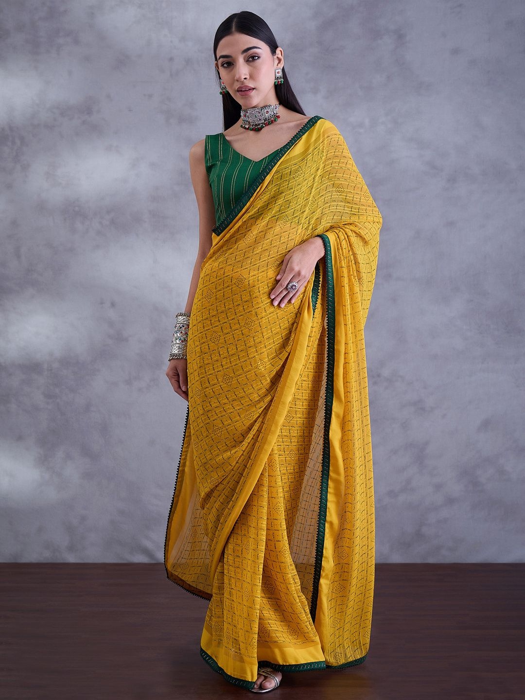 

Mitera Bagh Beads and Stones Pure Georgette Saree, Yellow