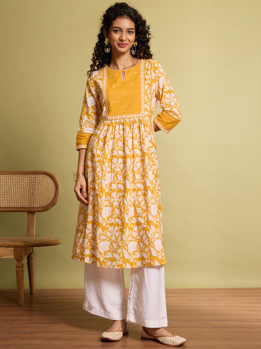 

Taneira Floral Printed Cotton Keyhole Neck A-Line Kurta, Yellow