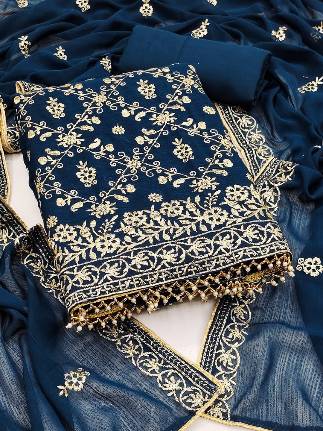 

Rangtulika Floral Embroidered Zari Unstitched Dress Material, Blue