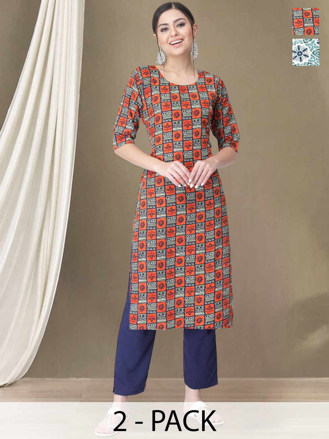 

Moda Rapido Selection Of 2 Ethnic Motifs Printed Round Neck Straight Kurtas With Trousers, Orange