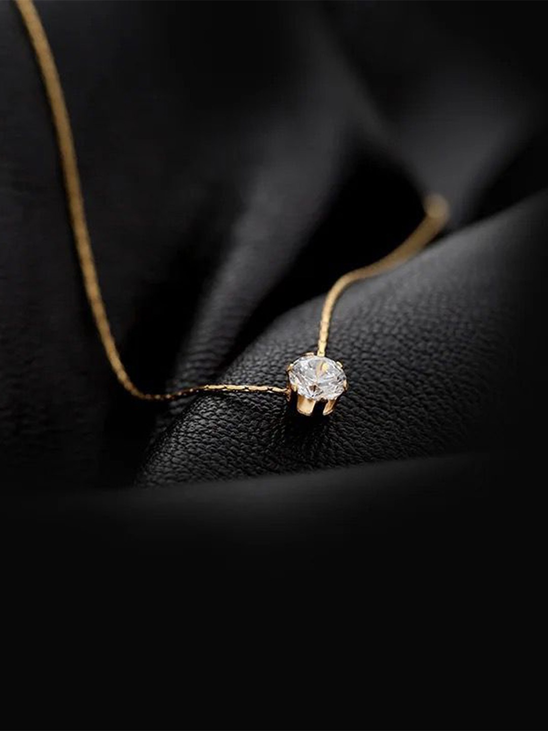 

DressBerry 18K Gold-Plated Artificial Stone Studded Stainless Steel Pendant With Chain