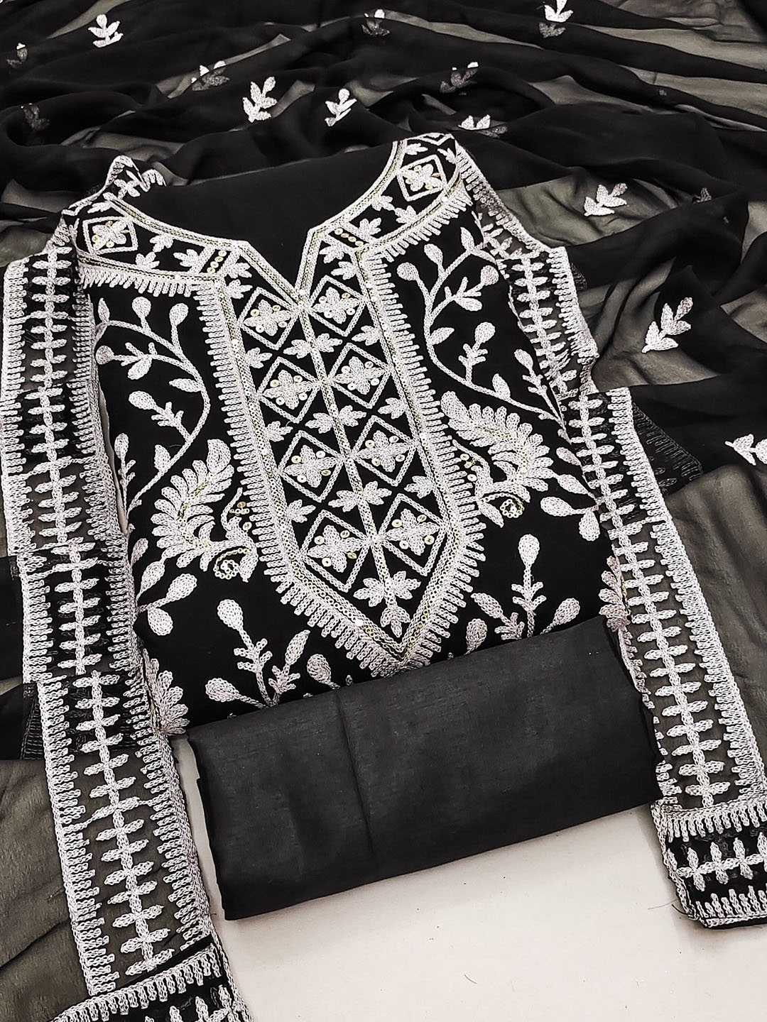 

Rangtulika Ethnics Floral Embroidered Unstitched Dress Material, Black