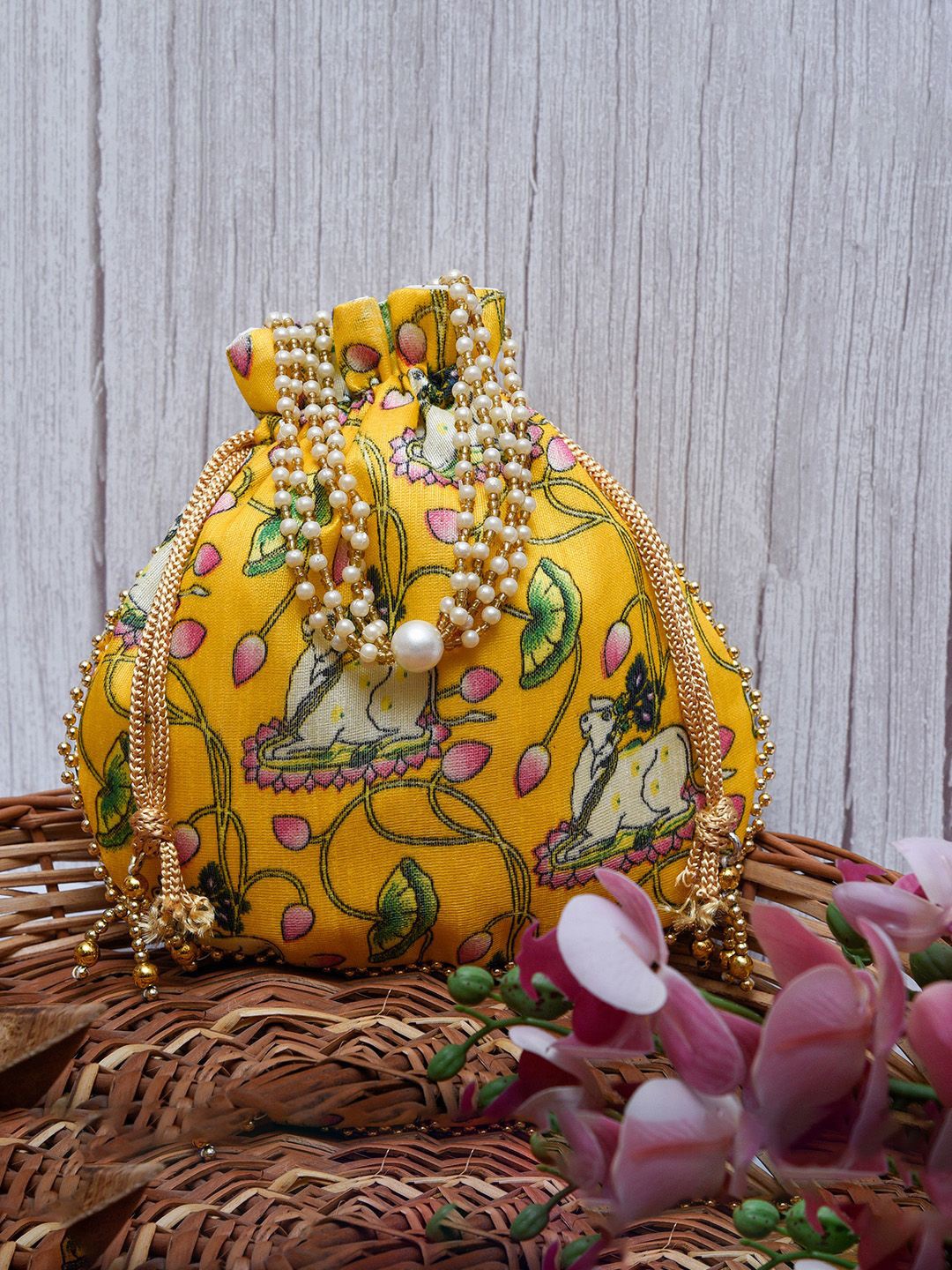 

Kuber Industries Printed Potli Clutch, Yellow